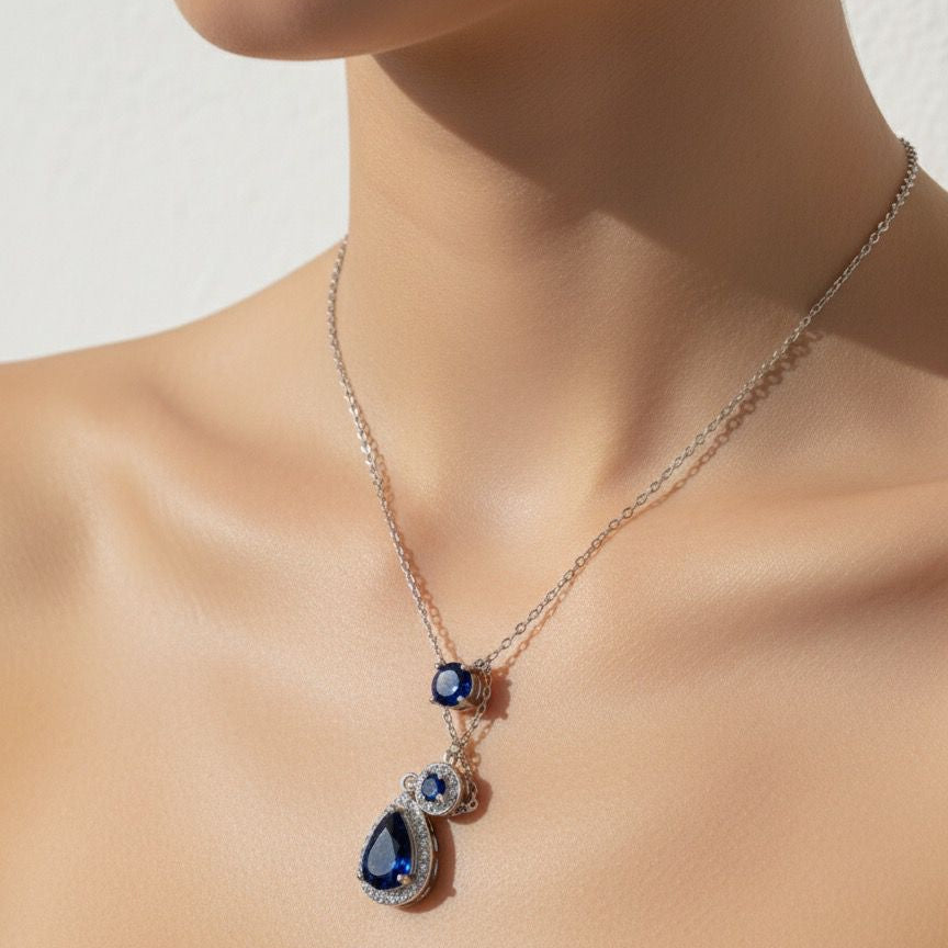 Necklace with a blue pendant on a mannequin