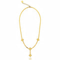 Gold necklace with star-shaped pendants on a white background