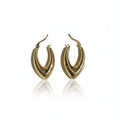 Gold hoop earrings on a white background