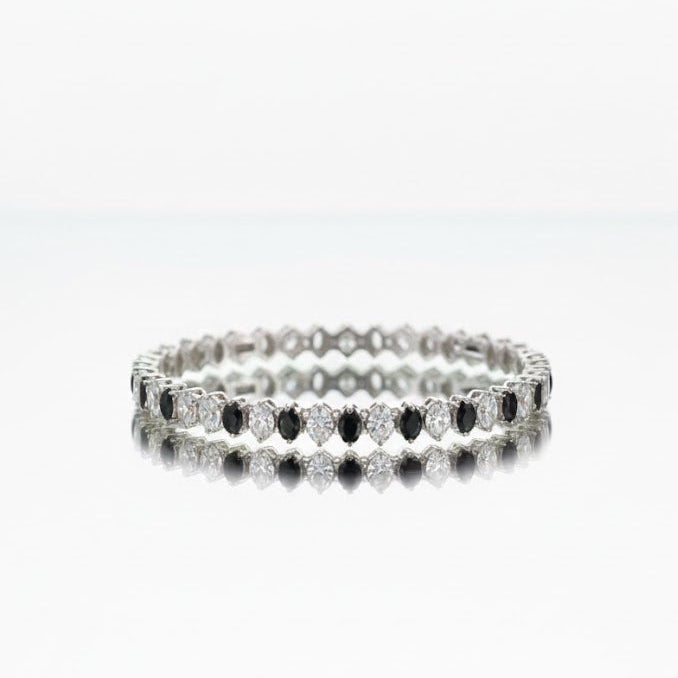 Stack of diamond rings on a white background